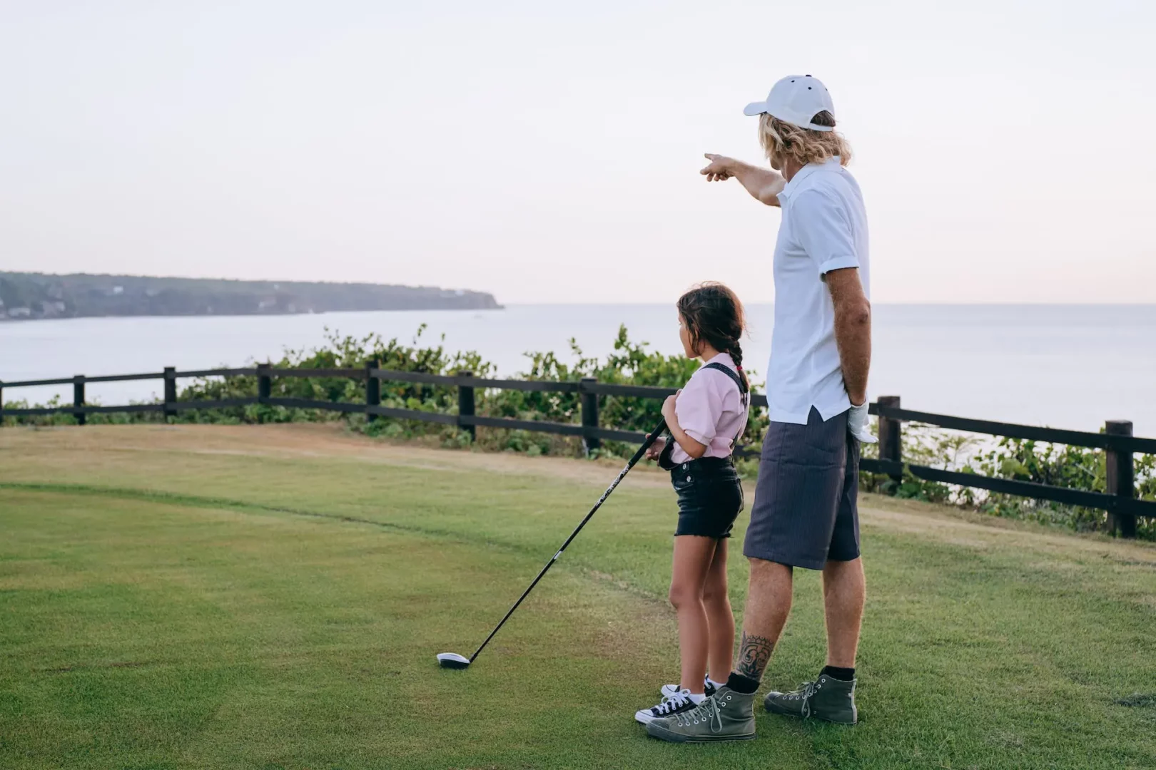 Golf teacher and student